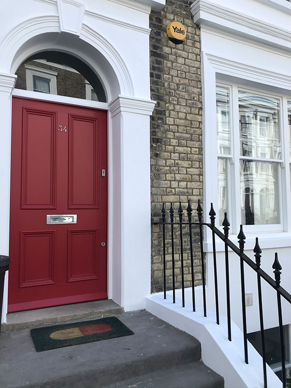 Exterior incarnadine painted front door